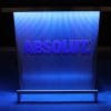 Custom branded DELUX portable bar with ABSOLUT vodka logo in matching Pantone color, blue lights on
